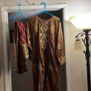 Three piece dress with embroidery. Pakistani dress.